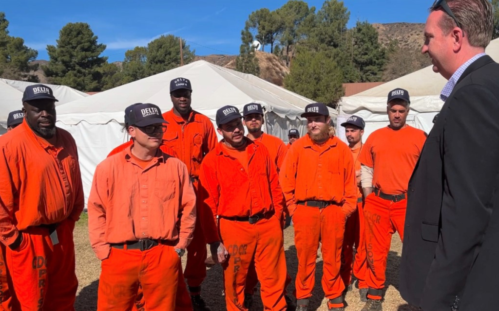 Incarcerated fire crews meet Secretary Macomber at Camp Holton.