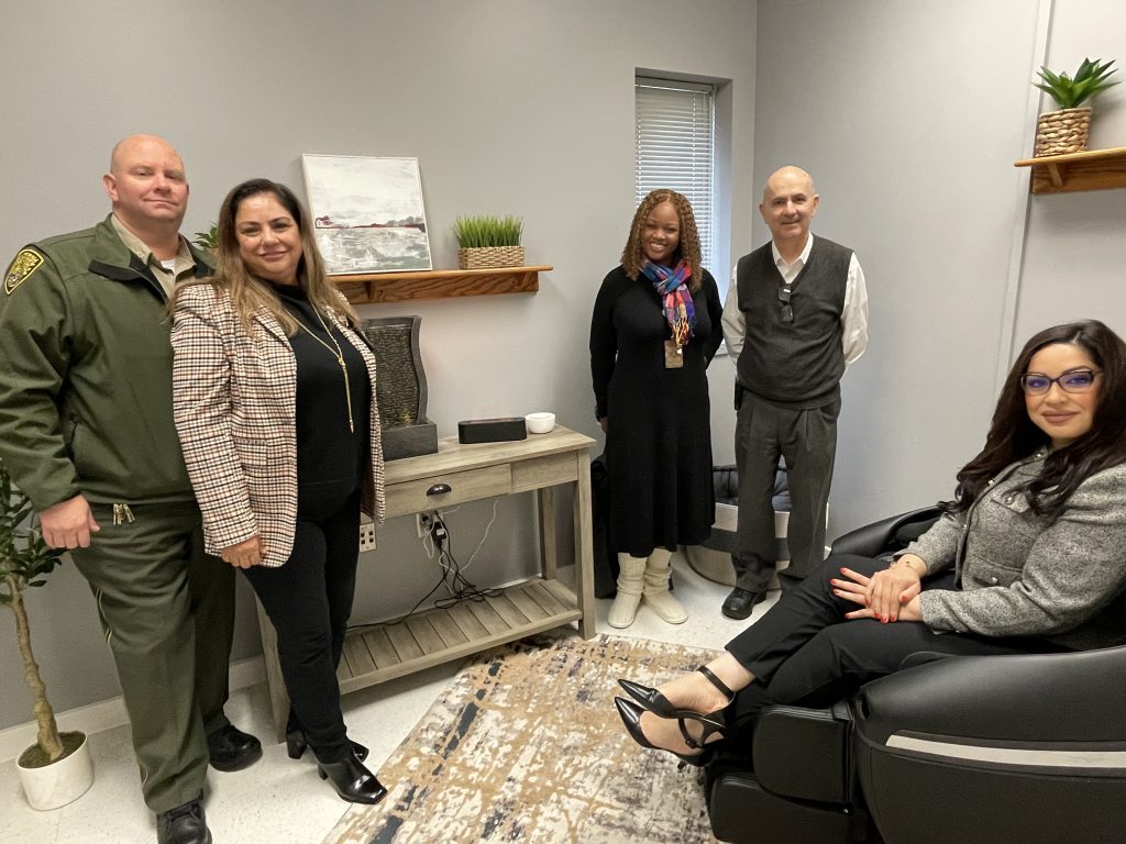 Five people at Valley State Prison in a new staff wellness room.