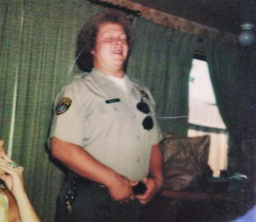 John Bennett as a correctional officer in his early years wearing his uniform.