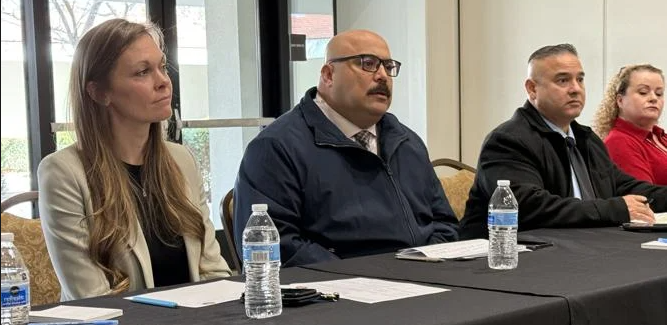 Photos of CIM personnel, including acting warden 