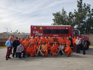 VTC and incarcerated fire crews in front of a CalFire truck
