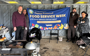 CTF food service week celebration with staff holding an appreciation barbecue.