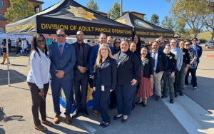 Group photo of staff from the Division of Adult Parole Operations Community Reentry Unit fair in Vista, California.