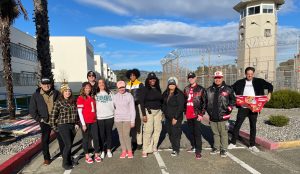 Staff members outside posing for photo