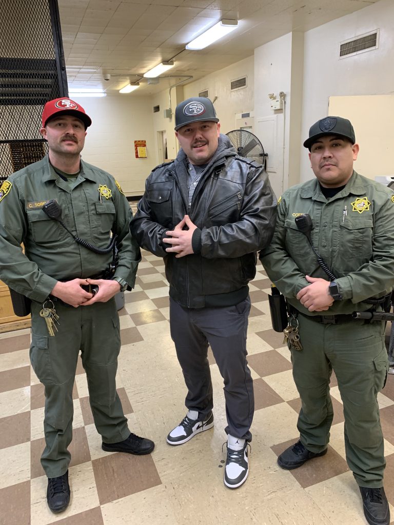3 staff members wearing sports attire