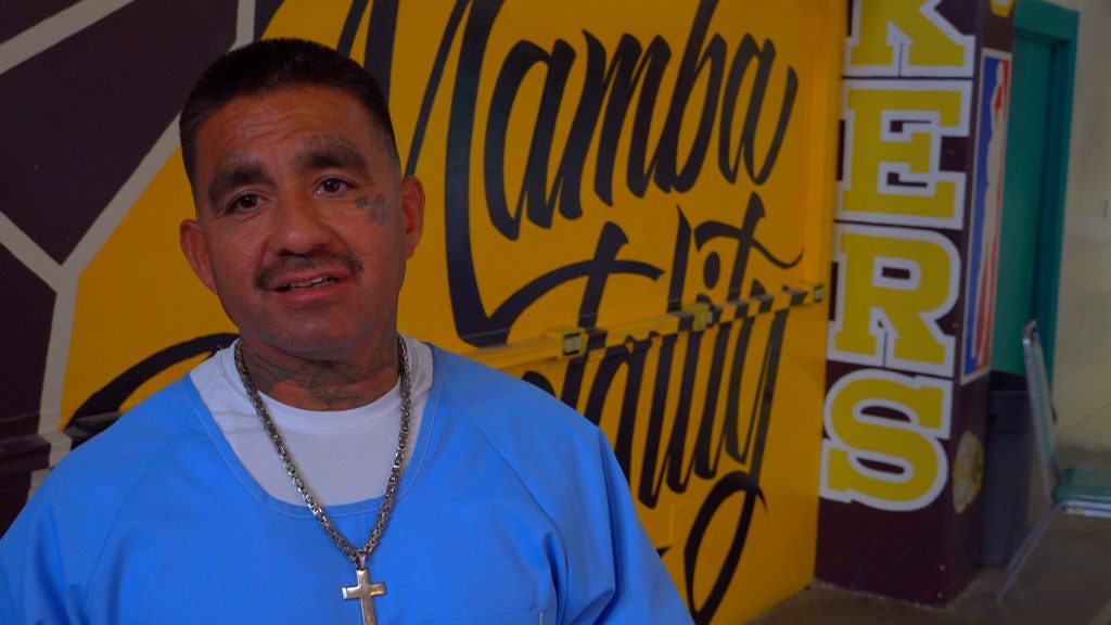 Incarcerated mural artist Larry Flores at CSP-Los Angeles County.