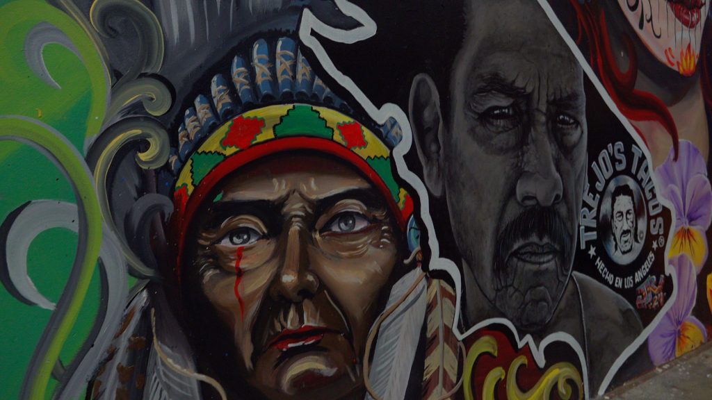 Los Angeles culture depicted in murals at a prison.