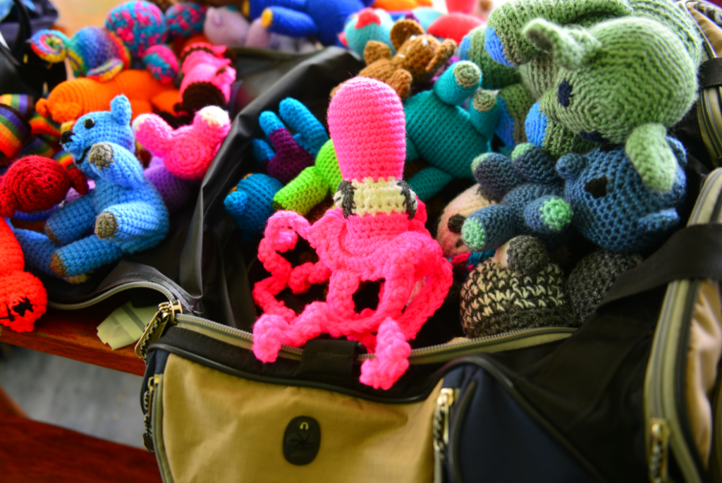 Stuffed animals being packed for a plane flight to the Philippines.
