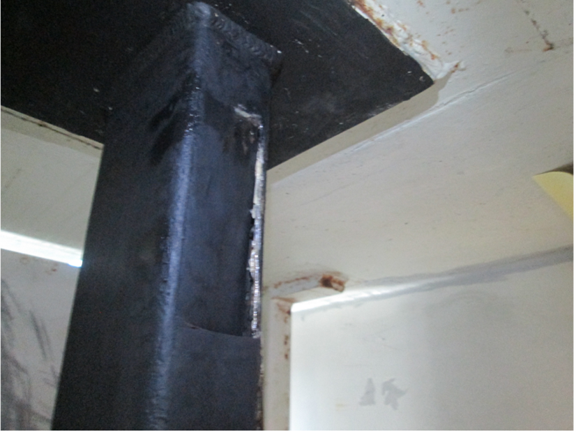 A post with a hold to hide contraband in a prison.