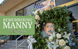 Remembering Manny 20 years with memorial photo surrounded by flowers