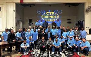 CTF Friendly Feud game group photo of staff and incarcerated people.
