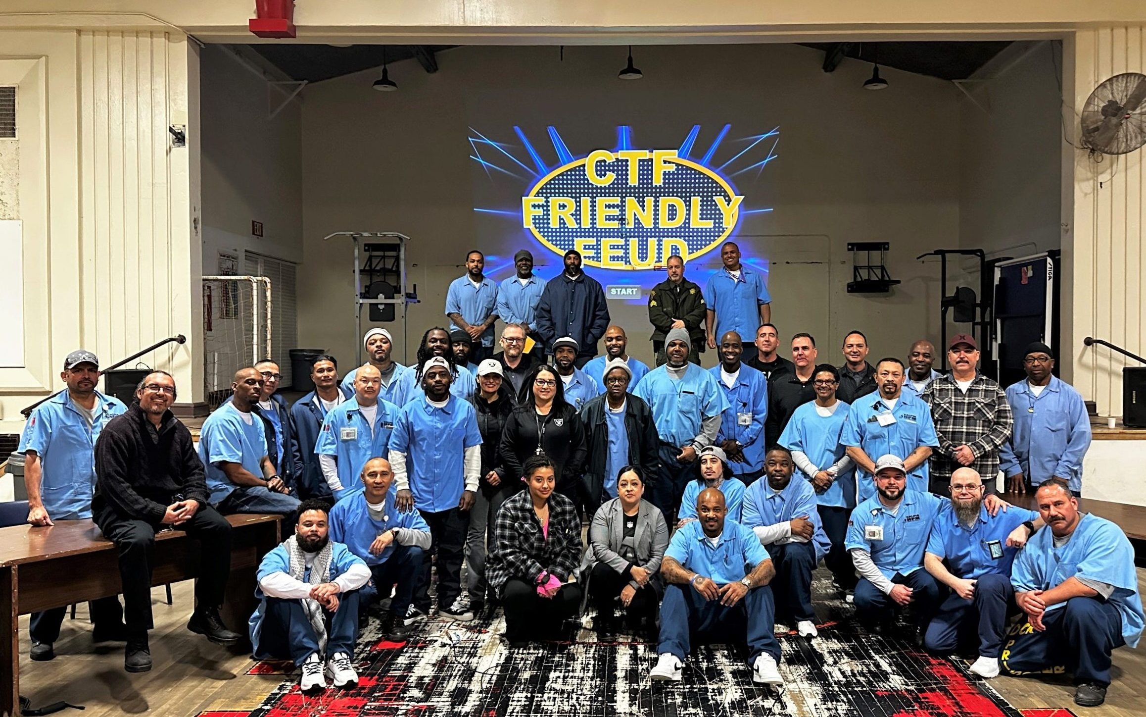 CTF Friendly Feud game group photo of staff and incarcerated people.