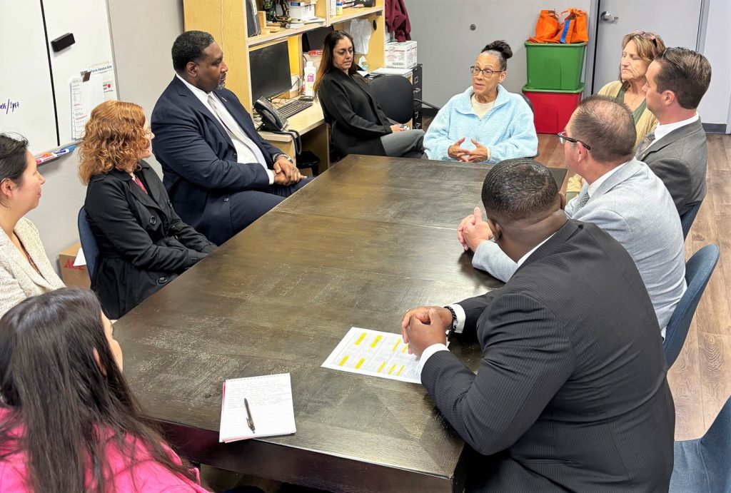 Learn and listening at a round-table discussion about the Female Community Reentry Program in Sacramento.