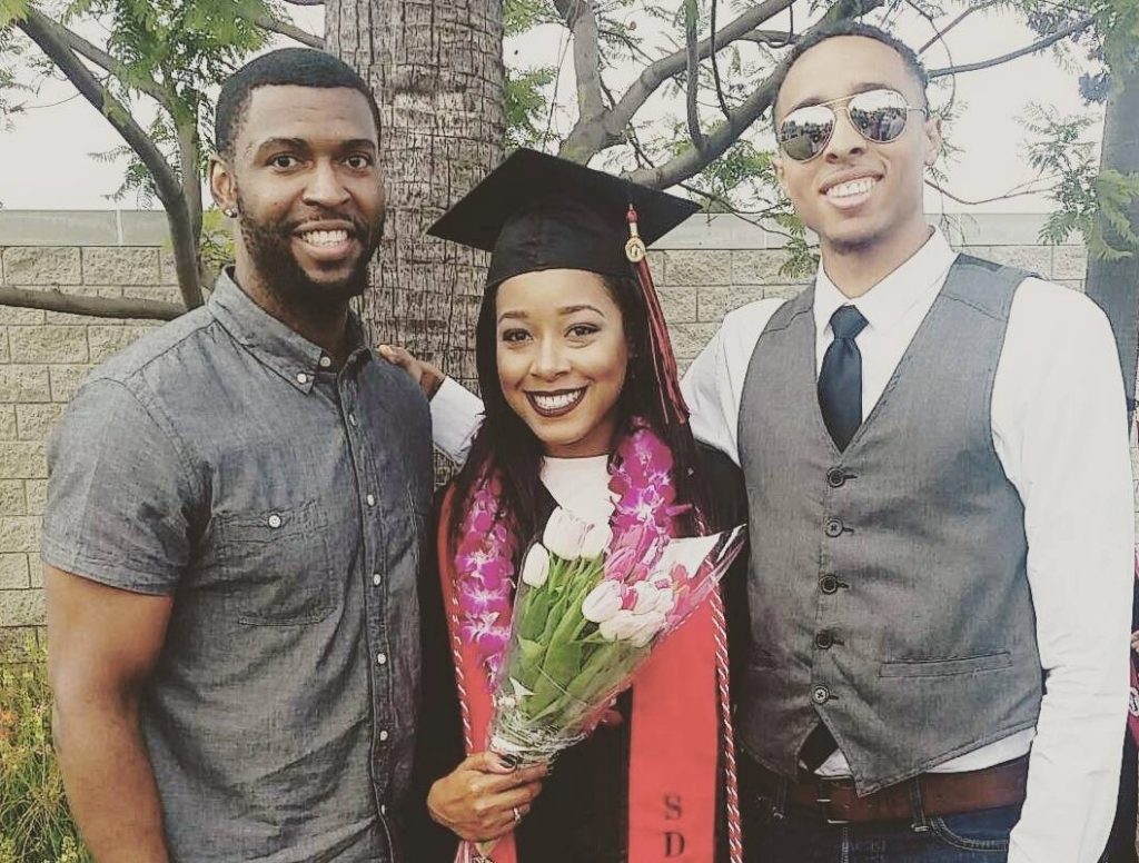 Walker with Neva Holmes and Joshua Holmes. 