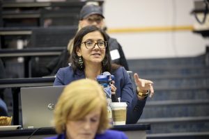 Mariam El-Menshawi, chief of OVSRS, speaks at a symposium on victims' rights.