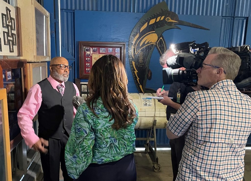 Phillip Davis speaks with the media at the graduation at CIM.