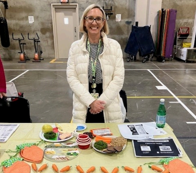 A dietician discusses healthier food options at Wasco State Prison during Patient Safety Awareness Week.