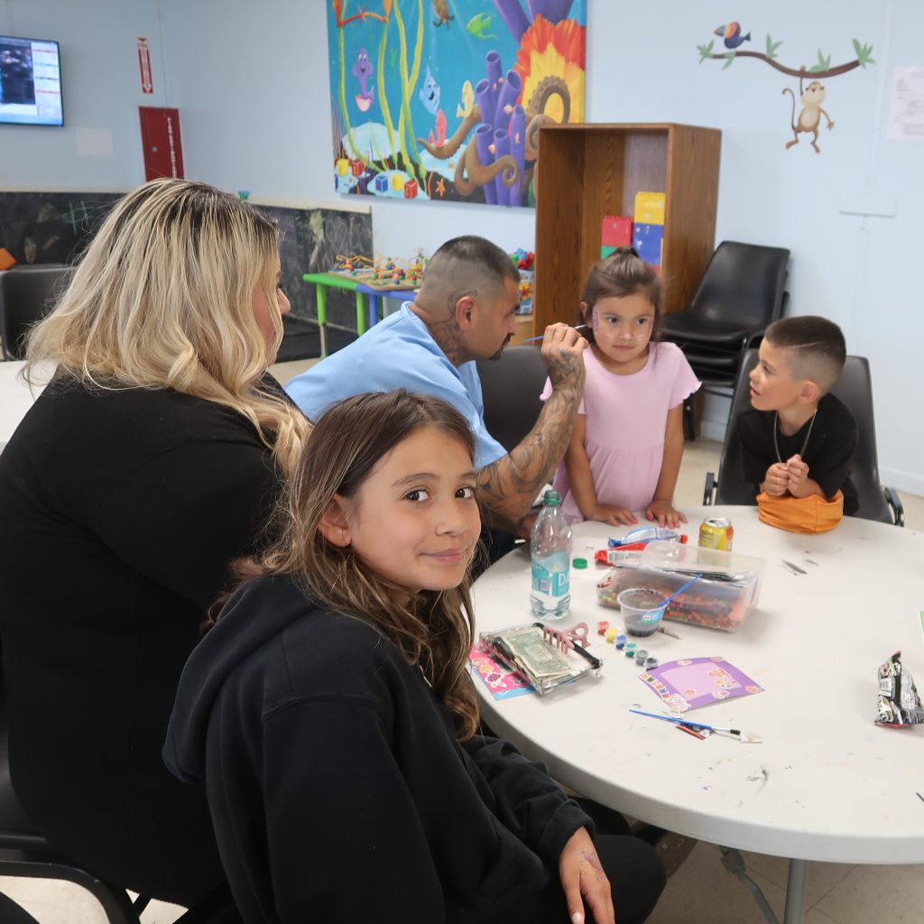 Face painting at Calipatria State Prison family visiting for Easter.