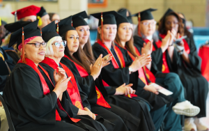 CCWF students cheer on others during the CSU-Fresno graduation.