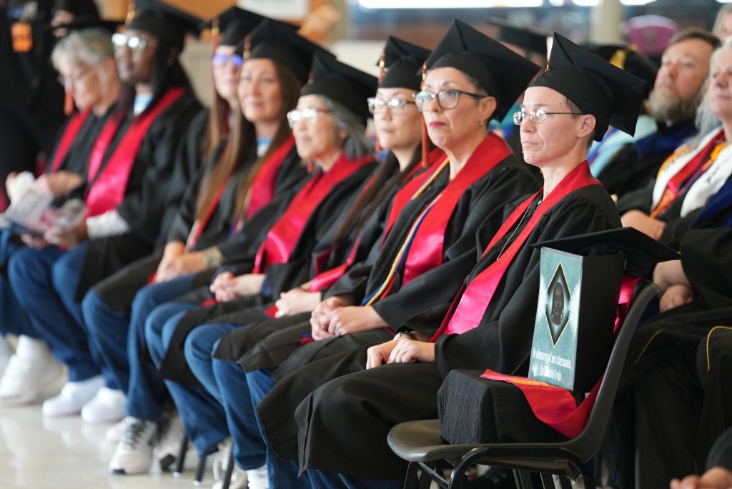 Group of graduates in the audience. 