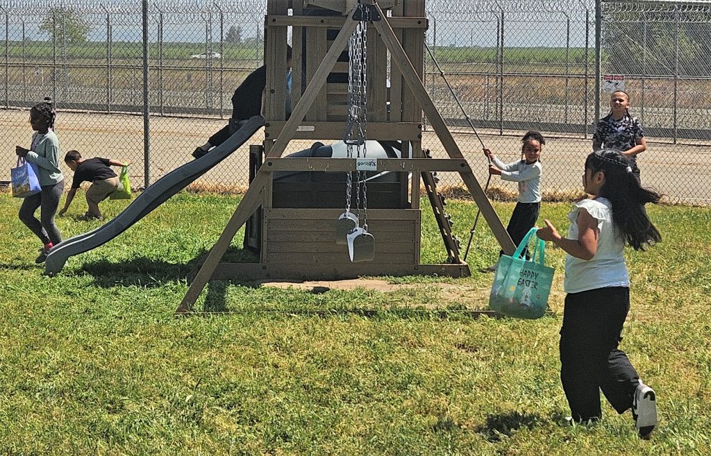 An Easter egg hunt in the visiting play area at CCWF in Chowchilla.