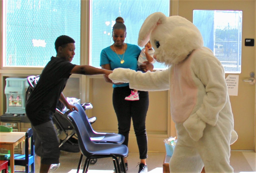 Peter Rabbit and a child at CHCF.