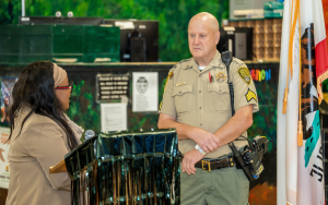 CMF 70 years anniversary celebration with a sergeant and the warden.
