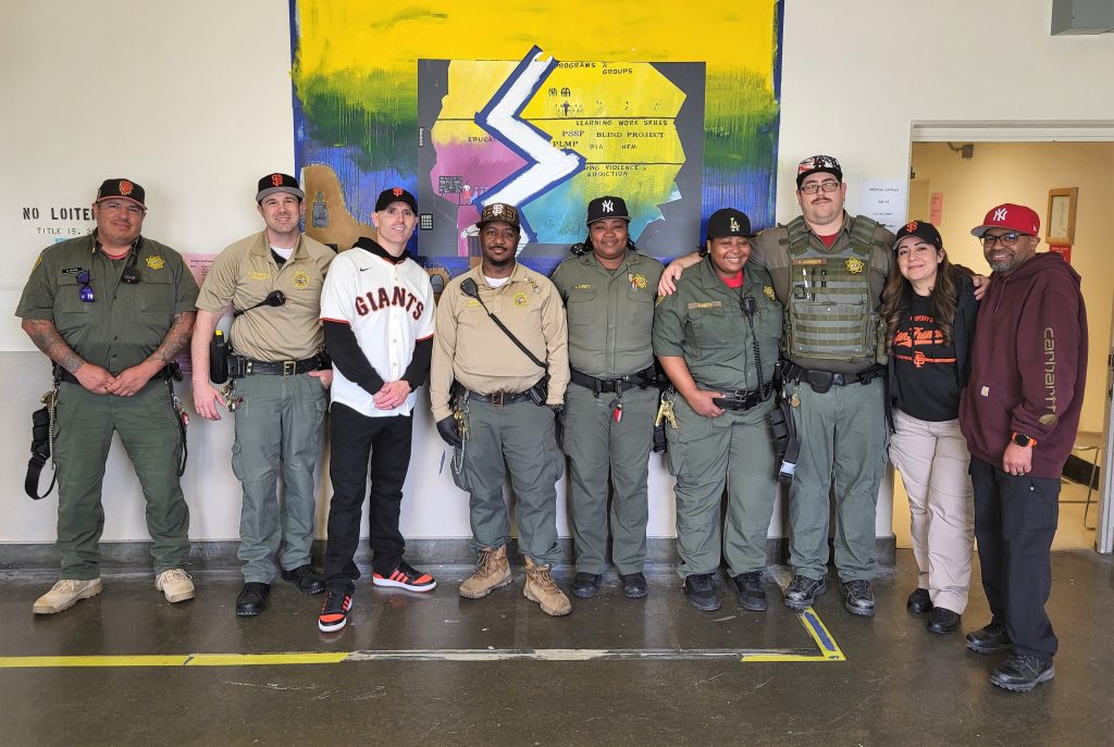 Opening day for baseball season with hat being worn by staff at CMF.