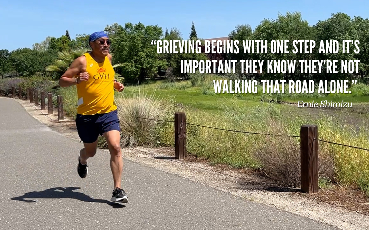 Ernie Shimizu runs on a paved path. Over the photo is this quote: “Grieving begins with one step and it’s important they know they’re not walking that road alone.”