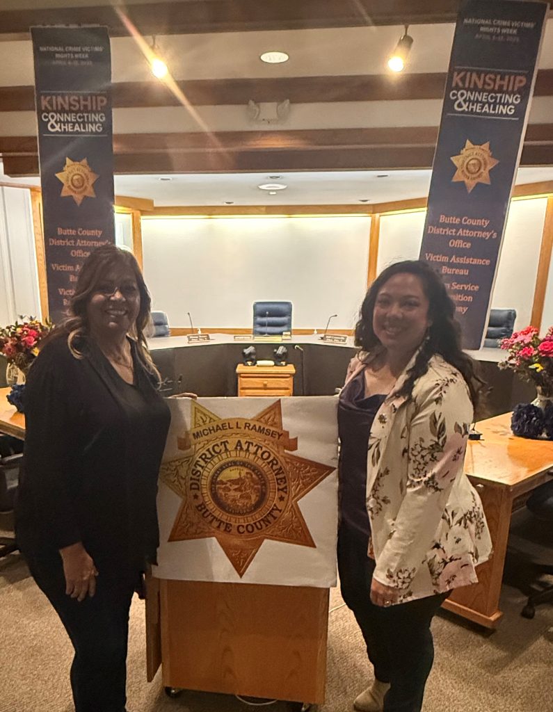 Two representatives infront of podium at Butte County Recognition ceremony NCVRW 2025