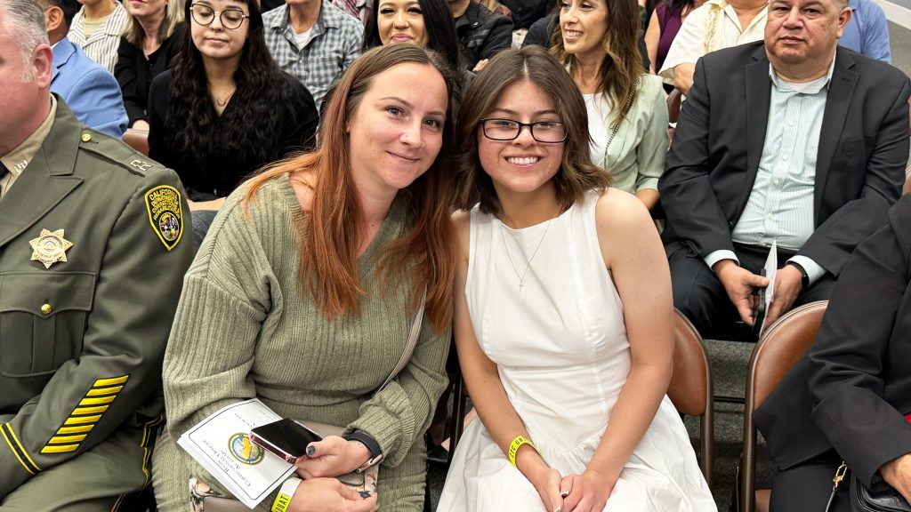 Vanessa with her mother at the graduation.