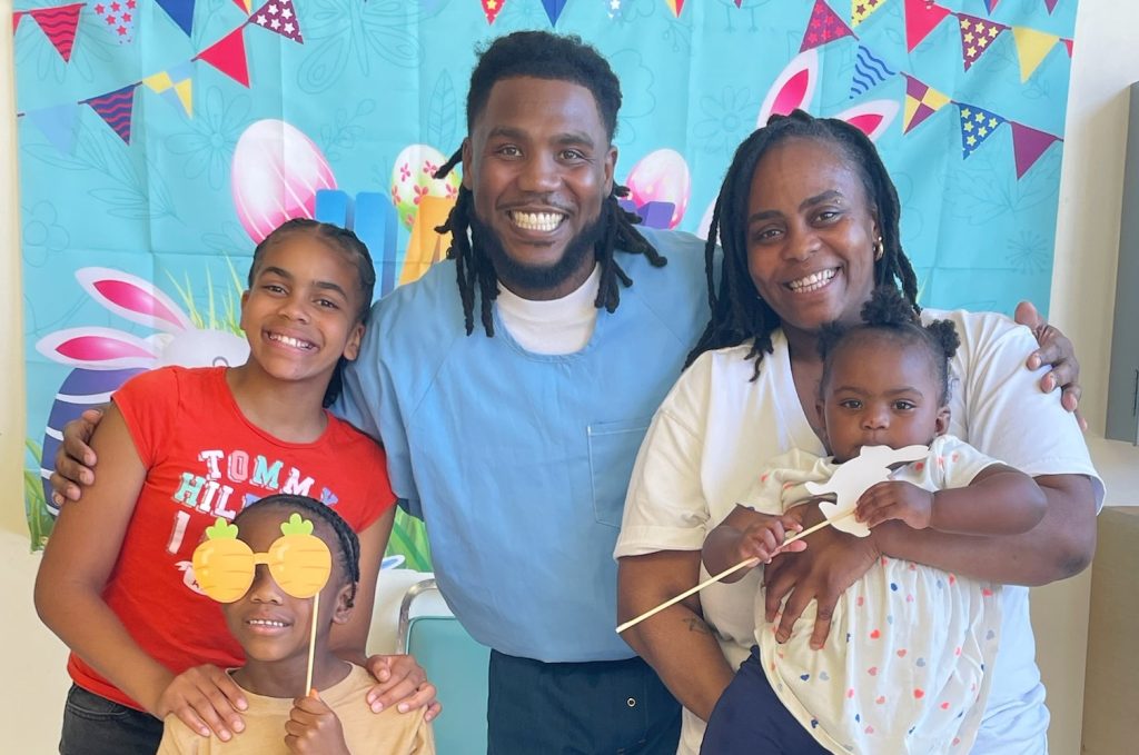Two kids, a mom, and an incarcerated man at SATF. 