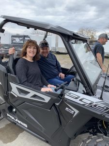 Nancy Clark SxS vehicle with husband