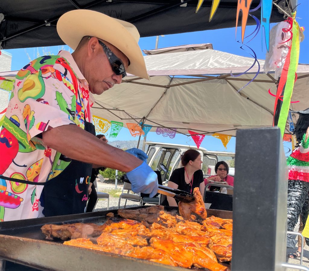 Grilling chicken at CCI-Tehachapi for Cinco de Mayo.