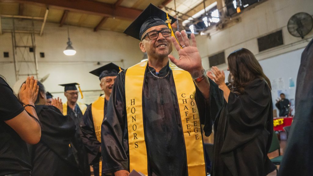Graduates proudly walk through the ceremony at CIM for Chaffey College's graduation.