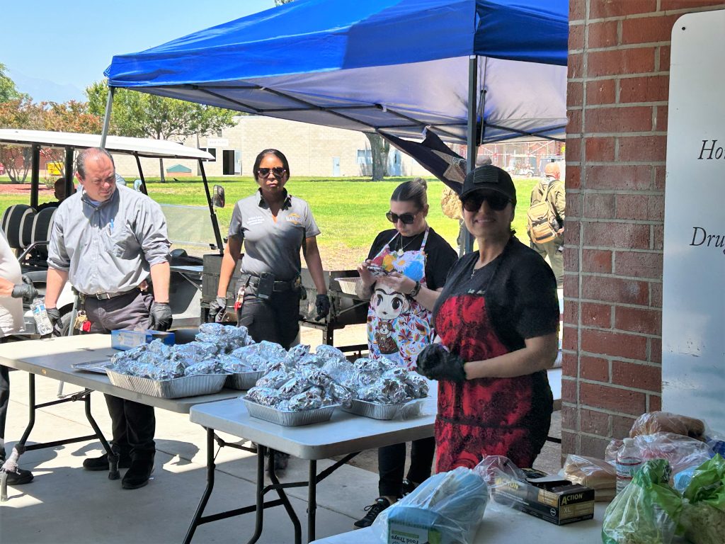 Burgers and hotdogs at the ready for the CIW staff appreciation event.
