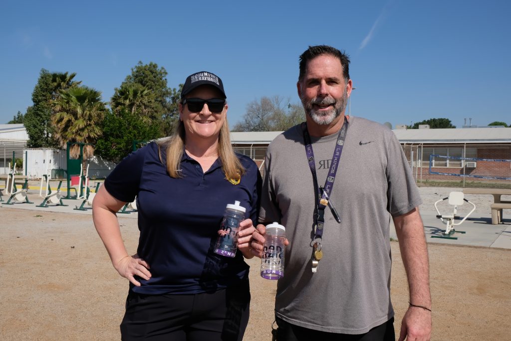 Coach Heidi Wippel and CIW Coach Aaron Moore at the CIW 5k Run to Rebuild. 