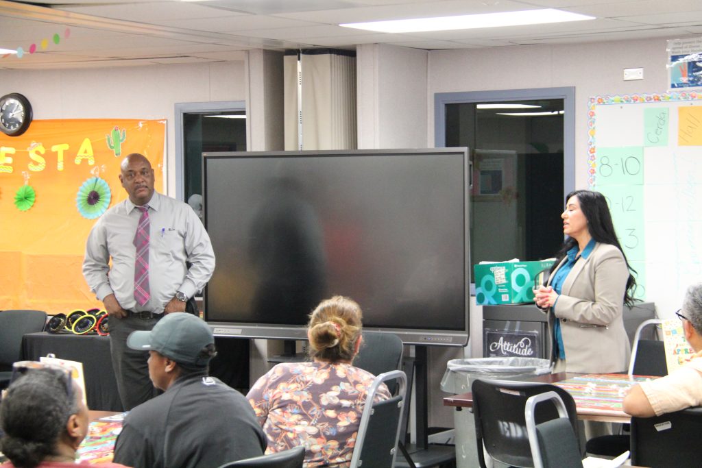 Executives speak during the luncheon at CIW.