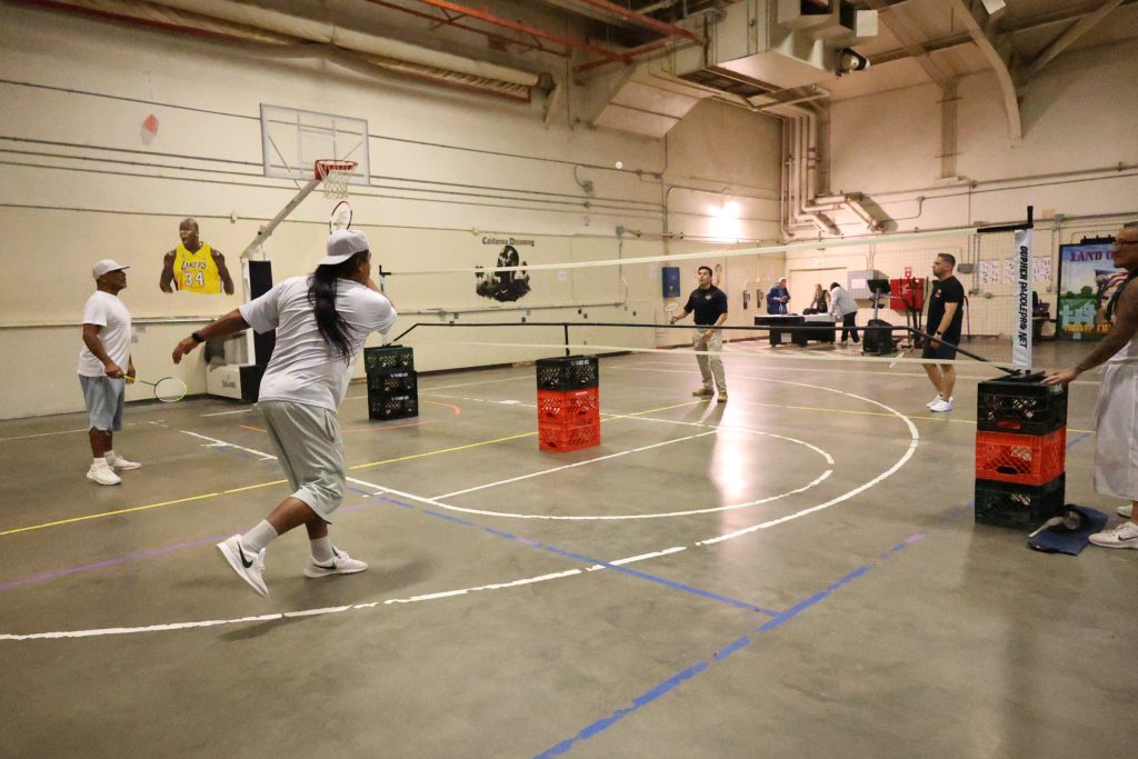 A badminton game in the Facility B gymnasium at CTF-Soledad.