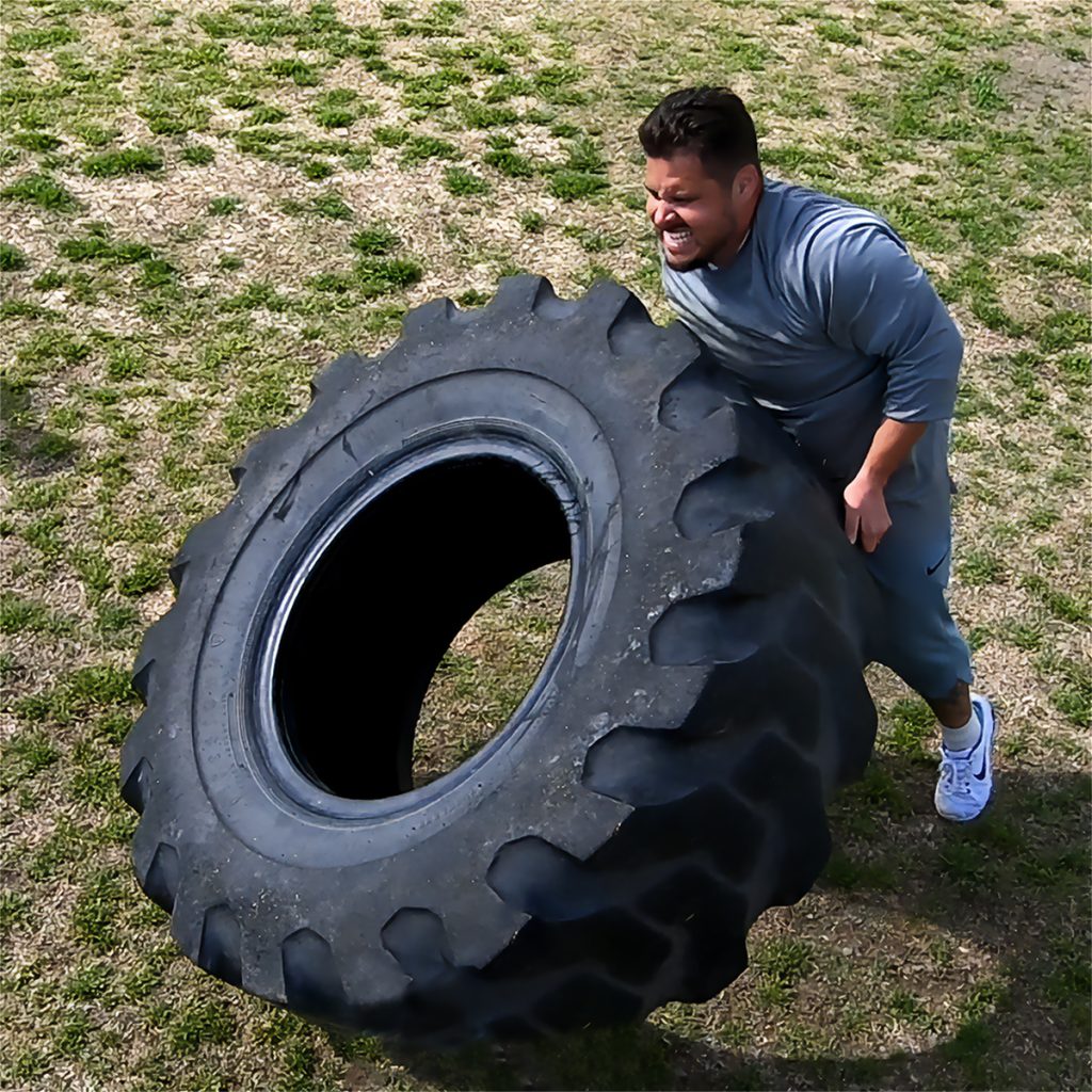 Incarcerated person flipping tire
