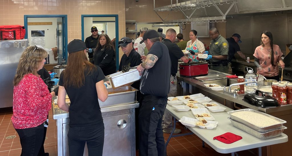 Preparing food for a staff appreciation event at High Desert State Prison in Susanville. 