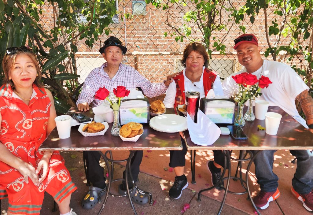 Four people at a Mother's Day visiting event for the Male Community Reentry Program, Los Angeles 2.