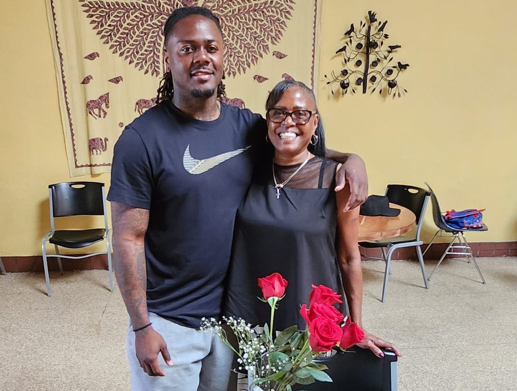A man with his mom at a Mother's Day visiting event for the Male Community Reentry Program, Los Angeles 2.