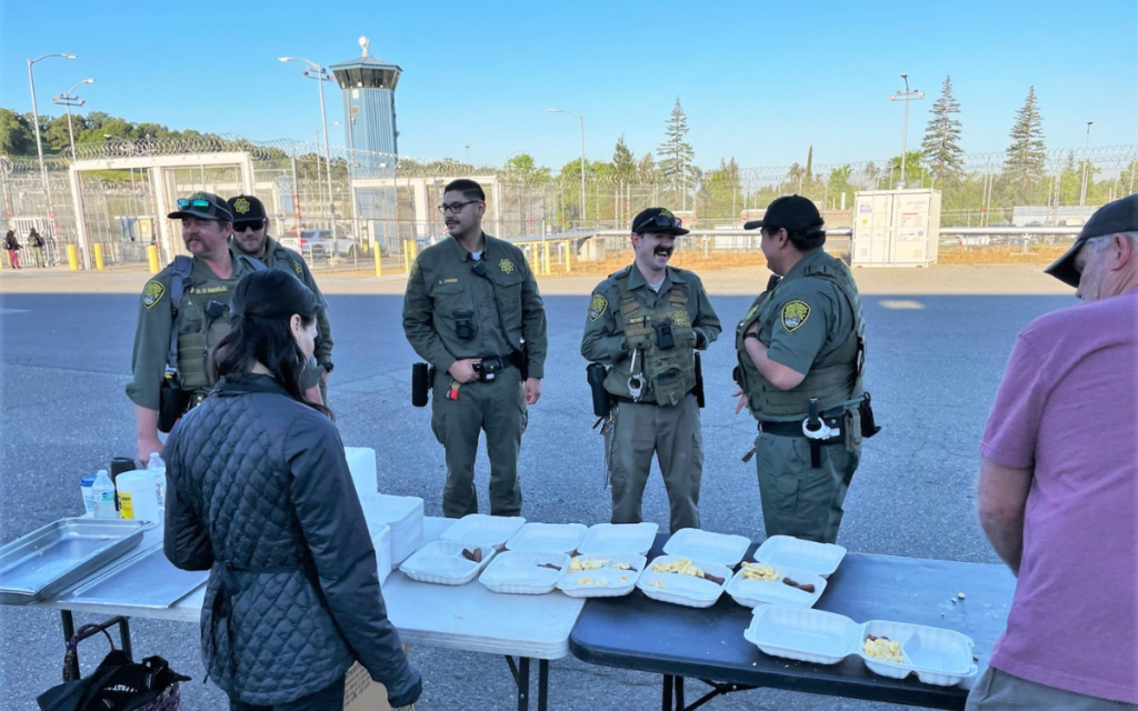 Serving breakfast to staff at CSP-Sacramento during an appreciation event.