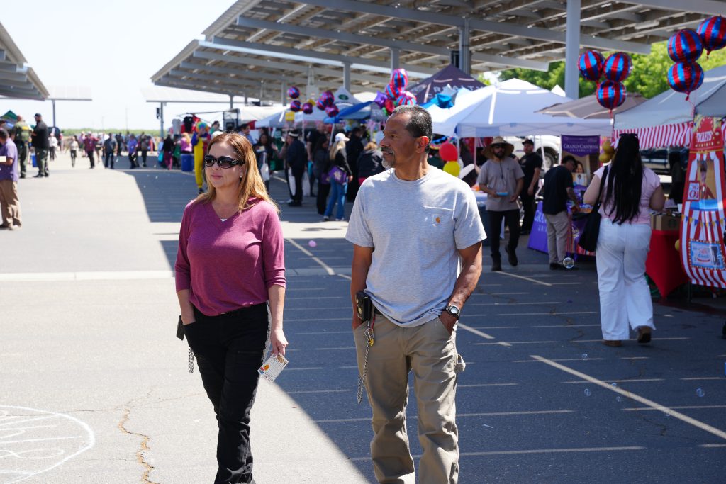 Employees check out the vendors at the staff wellness fair at Valley State Prison in Chowchilla, California.