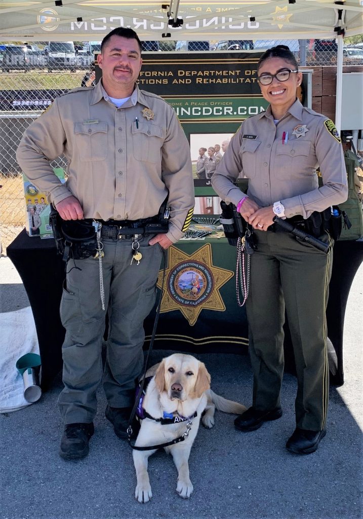 CDCR recruiters with Anna, a staff support dog at Salinas Valley State Prison. 