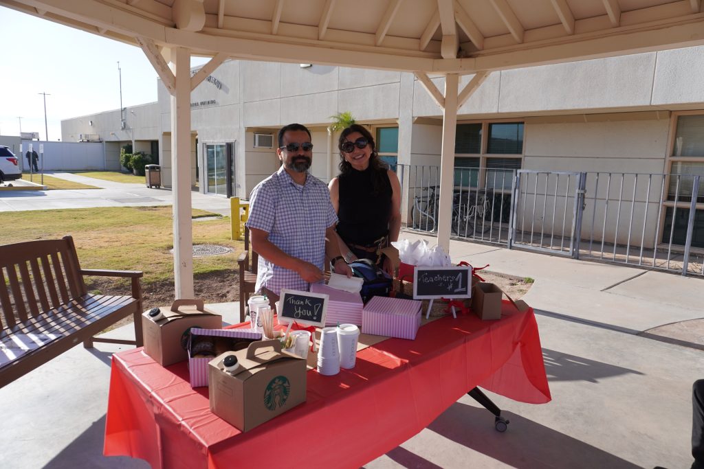 Teacher appreciation table decorated, with coffee and donuts