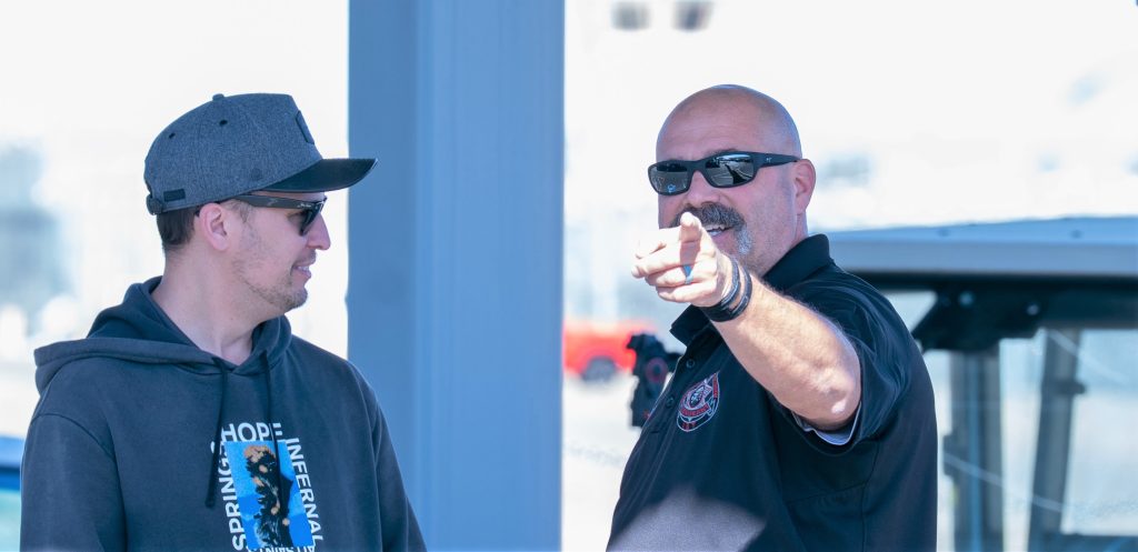 Two staff members talking at CCWF.