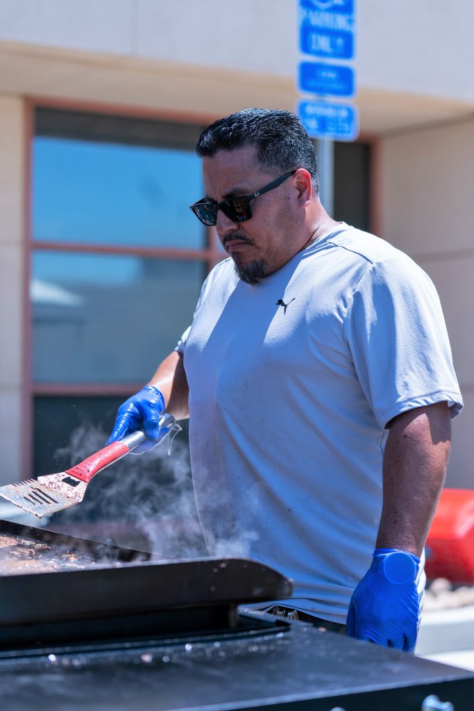 Working the grill for a staff health and wellness fair at CCWF in Chowchilla.