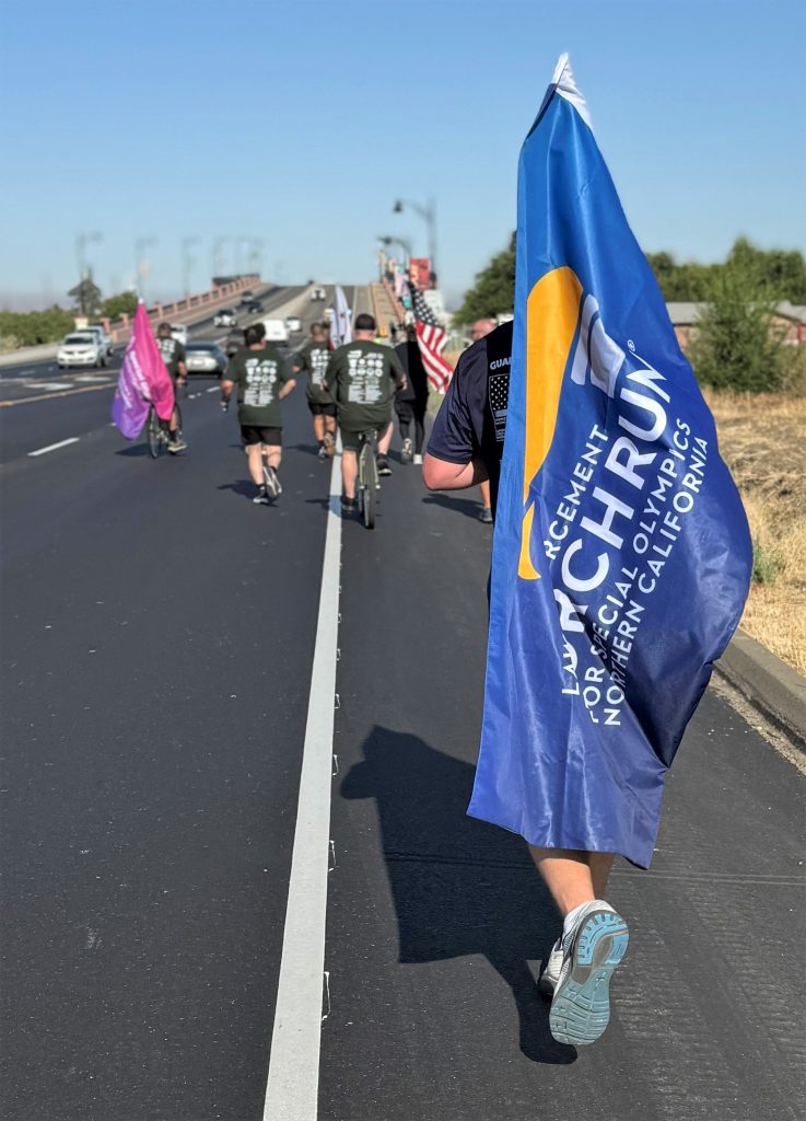 Carrying the torch run flag through Tracy.